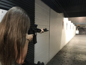 girl shooting rifle